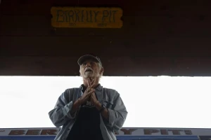 Joe Griffin, president of the Citizens Technical Environmental Committee, speaks during a presentation on the migratory waterfowl protection program at the Berkeley Pit viewing stand in Butte on July 16. Photo Credit: Megan Nielsen, Montana Standard