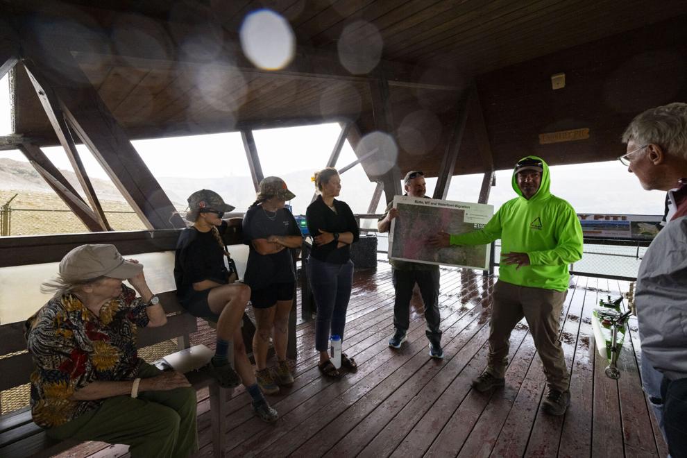 Mark Mariano, waterfowl protection specialist for Fairweather IT and AppSciTec, gives a presentation on the migratory waterfowl protection program at the Berkeley Pit viewing stand in Butte on July 16. Photo Credit: Megan Nielsen, Montana Standard