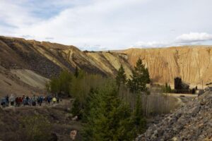 Attendees walk down to the historic Pilot Butte Mine during a tour led by CTEC in Butte on Thursday. MEGAN NIELSEN, Montana Standard