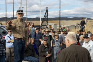 Joe Griffin, president of the Citizens Technical Environmental Committee, speaks to a crowd of over 100 people during a tour led by CTEC to the historic Pilot Butte Mine in Butte on Thursday. MEGAN NIELSEN, Montana Standard